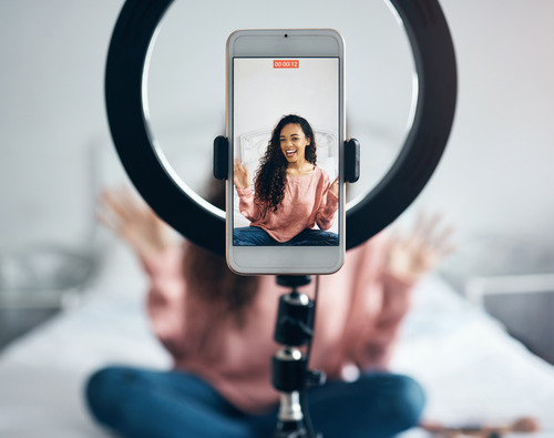 female influencer recording